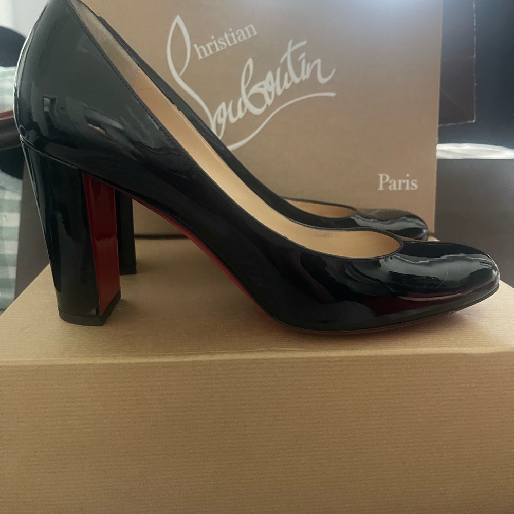 Christian Louboutin black patent pumps